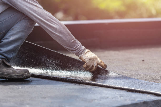 Professional Waterproofing technician working in Batavia, NY